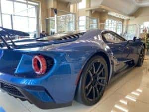 shiny blue 2019 ford gt on display in showroom
