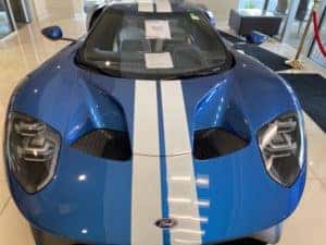 shiny blue 2019 ford gt on display in showroom