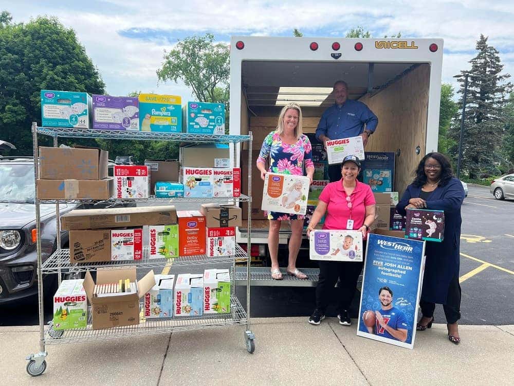 West Herr employees donating to United Way Community Baby Shower