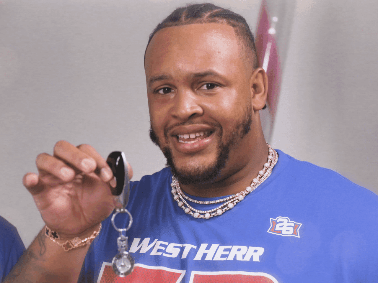 Dion Dawkins holding car keys