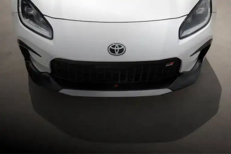 Front of white Toyota